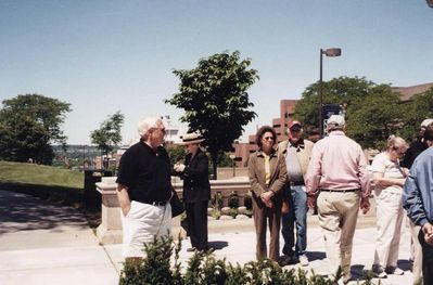2004 Syracuse Reunion
At Syracuse University.
L to R: Harry Johnson, `51; Unidentified woman; (back to camera) John Centra, `54; Unidentified woman
