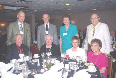 2006 Reunion 75th Anniversary 1952 1953 1954 Table
Seated, L to R:  Paul Ward, `53; Doris Vater Ward, `52; Veronica Mitchell; Joanne Krchniak;
Standing, L to R:  Ben Button, `54; Harold Smith, `53; Barbara Van Horne Smith; Milan Krchniak, `53
