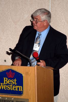 2006 Reunion 75th Anniversary Program Initiation Rite Photo 3
In this photo the re-initiation ceremony was conducted by Jim Sweet, `56, President, pictured.  Most of the nine past presidents in attendance participated in the ceremony, assisted by other members.  See the list in Photo 2.
 
