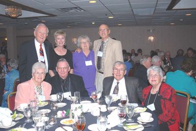 2006 Reunion 75th Anniversary 1952 1953 1954 Table
Seated, L to R:  Palmina Calabrese Weigand, `54; Art Weigand, `53; Dick Jacobson, `53; Margaret Eckert Jacobson, `54;
Standing, L to R:  Jim Panton, `53; Georgiana Panton; Sally Litz Schaertl, `53; George Schaertl, `52
