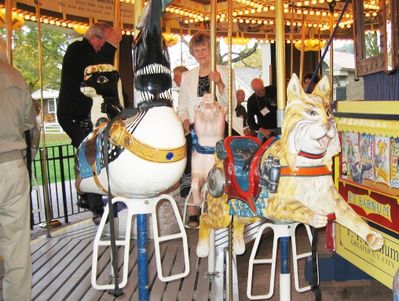 Cooperstown 2007 Empire State Carousel
Bob Coan (holding on for dear life) and Jan Higham ride the Carousel
