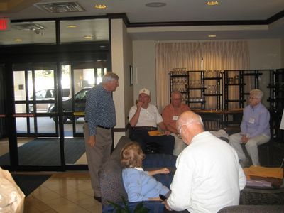 2010 Reception - 05
Background: Ron Graves, `58; Jim Finnen, `54; Herb Egert, `53; Pam Calabrese Weigand, `54;
Foreground (backs to camera): Arline Lacy Wood, `54 and George Wood, `54

