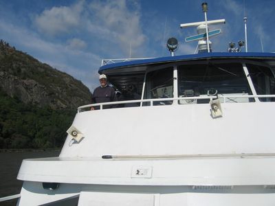 2010 Tours Boat
"Cap'n" John Rookwood, `57, surveys the scene from the bridge aboard the Pride of the Hudson.
