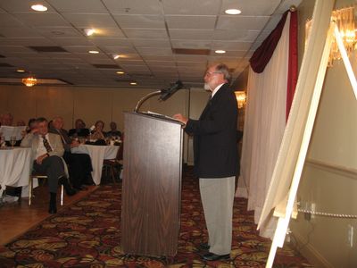 Saturday Banquet
Eugene McLaren, 45, addresses audience at Open Mike about his recollections from the era 1941-1945 (He took time out for military service).

