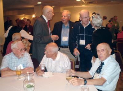 Friday Evening Reception
Seated, L to R: Harry Johnson, 51; Dan Tauroney, 51?; Carroll Judd, 53;
Standing: Ken Ludlum, 51?; Paul ward, 53; Tom Yole, 52; Kathryn Loucks Johnson, 51 (back to camera).
