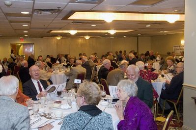 Saturday Banquet
Partial Dining Room View
Table in foreground, Clockwise from upper right:
Gerry Holzman, 54; Arlene Holzman; Barbara Persico; Dick Persico, 55; (hidden) Arline Lacy Wood, 54; George Wood, 54
