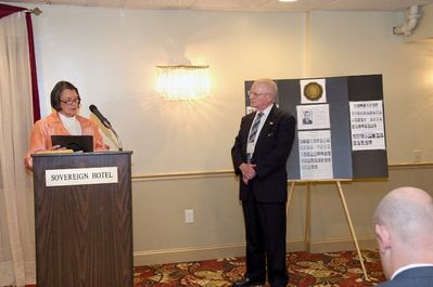 Saturday Banquet
Alumni Association President, Kay Hotaling, reads citation on plaque from Alumni Association Board of Directors given to Jack Higham in recognition of his service toPotter Club and to the Alumni Association.

