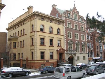 Potter House 4 - 415 State Street
There was no Potter House from 1943 to 1948. When the Club reorganized in 1948, the house at 415 State Street became Potter House.  It housed men at times on 4 floors, including a room at the front in the basement.  The basement also housed the kitchen.  The main floor contained a living room, two dining rooms, a library, and a serving kitchen.  Men were housed on the second and third floors with rooms ranging from capacities of 2 to 4.  Three additional rooms located on the fourth floor housed some of the kitchen and wait staff.  These rooms included a single and two doubles.  The rest of the 4th floor was attic.

The building (as it appears in 2006) was leased from the Albany YMCA which occupied the mirror-image building across the courtyard at the left of the photo.  The house at 415 State Street was occupied from 1948 until 1964.  The building is now part of the Nelson A. Rockefeller Institute of Government, housed in the adjoining building at 413 State Street.  415 State Street is known as the Malcolm Wilson Building.
