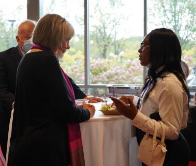 Potter Club 90th Anniversary October 15, 2021
Peggy Hogan and Djanie Thermutis, UAlbany Student Ambassador
Doug Penfield, `60 in background
